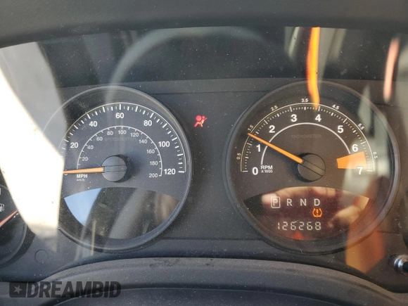 2014 Jeep Patriot Latitude with VIN 1C4NJRFB1ED847612, listed as a Copart auction lot 62721605 with 126,268 mi miles and Salvage title. Bid and sale history available at DreamBid. Image 9.