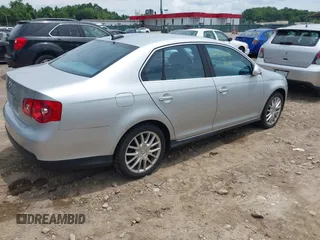 2006 Volkswagen Jetta GLI Turbo z VIN 3VWXJ71K06M728828, wystawiony jako IAAI lot #42477114 z przebiegiem 95 238 mil mil oraz . Historia ofert i sprzedaży dostępna na DreamBid. Obrazek 4.