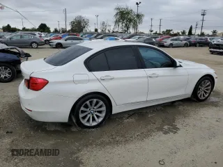 2013 BMW 3 Series 328i with VIN WBA3A5G57DNP23598, listed as a Copart auction lot 55677165 with 217,977 mi miles and Clean Title. Bid and sale history available at carsss.com. Image 3.