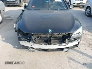 2013 BMW 7 Series 750i with VIN WBAYA8C59DC996552, listed as a IAAI auction lot 41921201 with 99,188 mi miles and . Bid and sale history available at DreamBid. Image 6.