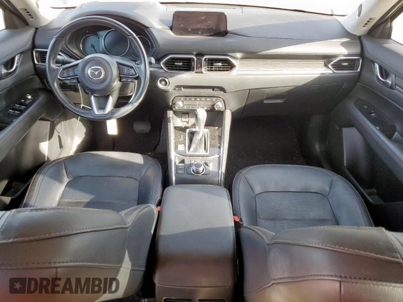 2019 Mazda CX-5 Grand Touring with VIN JM3KFADM8K1634011, listed as a Copart auction lot 57343455 with 67,138 mi miles and Salvage title. Bid and sale history available at DreamBid. Image 8.