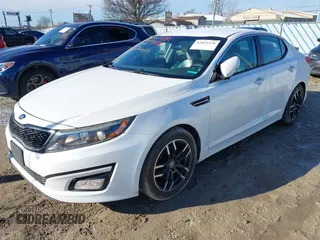2015 Kia Optima LX with VIN KNAGM4A73F5600350, listed as a IAAI auction lot 41811976 with 154,924 mi miles. Bid and sale history available at carsss.com. Image 2.