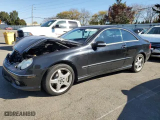 2003 Mercedes-Benz CLK-Class 5.0L with VIN WDBTJ75JX3F039229, listed as a Copart auction lot 77006714 with 111,617 mi miles and Salvage Title. Bid and sale history available at carsss.com. Image 1.