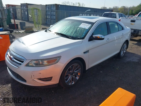 2010 Ford Taurus Limited with VIN 1FAHP2FWXAG112342, listed as a IAAI auction lot 42005142 with 148,947 mi miles. Bid and sale history available at carsss.com. Image 2.