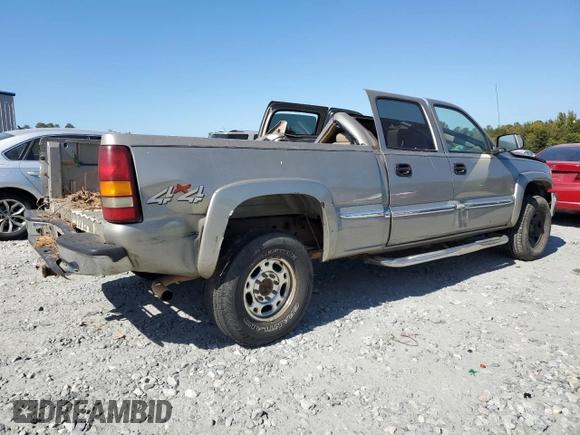 2002 GMC Sierra 1500HD SLE z VIN 1GTGK13U52F232896, wystawiony jako Copart lot #76999294 z przebiegiem Nie podano mil oraz Szkoda całkowita • Salvage title. Historia ofert i sprzedaży dostępna na DreamBid. Obrazek 3.