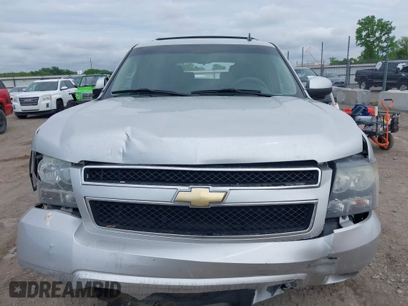 2011 Chevrolet Suburban LT with VIN 1GNSCJE05BR294452, listed as a IAAI auction lot 42107580 with 165,313 mi miles and . Bid and sale history available at DreamBid. Image 13.