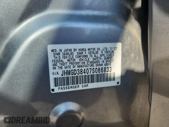 2007 Honda Fit with VIN JHMGD38407S066833, listed as a Copart auction lot 61713125 with 62,917 mi miles and Salvage title. Bid and sale history available at DreamBid. Image 12.