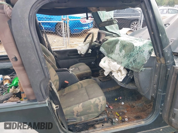 2004 Jeep Wrangler X z VIN 1J4FA39S84P714902, wystawiony jako IAAI lot #42011039 z przebiegiem Nie podano mil oraz . Historia ofert i sprzedaży dostępna na DreamBid. Obrazek 5.