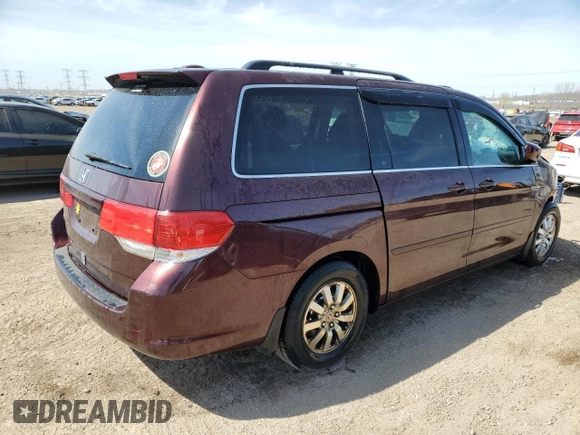 2010 Honda Odyssey EX-L with VIN 5FNRL3H60AB041353, listed as a Copart auction lot 52801315 with 120,253 mi miles and Salvage Title. Bid and sale history available at DreamBid. Image 3.