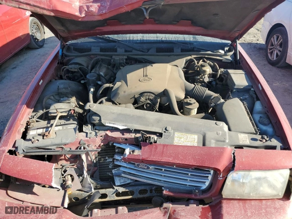 2000 Ford Crown Victoria LX with VIN 2FAFP74W2YX125453, listed as a Copart auction lot 73491924 with 235,058 mi miles and Salvage Title. Bid and sale history available at carsss.com. Image 11.