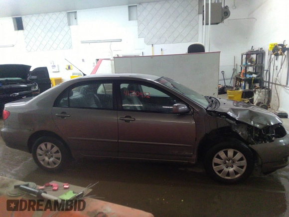 2004 Toyota Corolla CE with VIN 1NXBR32E14Z204650, listed as a IAAI auction lot 41710452 with 168,099 mi miles. Bid and sale history available at carsss.com. Image 13.