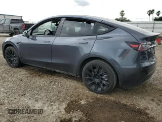 2021 Tesla Model Y Long Range z VIN 5YJYGDEE2MF253676, wystawiony jako Copart lot #54446525 z przebiegiem 36 161 mil mil oraz Szkoda całkowita • Salvage title. Historia ofert i sprzedaży dostępna na DreamBid. Obrazek 2.