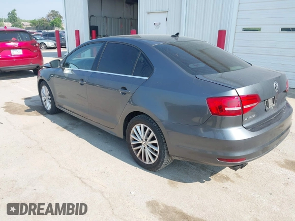 2015 Volkswagen Jetta SE with VIN 3VWD07AJ2FM310154, listed as a IAAI auction lot 42456136 with 96,979 mi miles and . Bid and sale history available at DreamBid. Image 3.