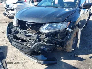 2017 Nissan Rogue SV with VIN KNMAT2MV0HP563632, listed as a IAAI auction lot 41827113 with 193,323 mi miles and . Bid and sale history available at carsss.com. Image 6.