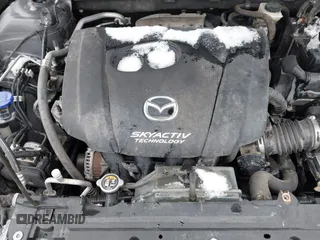 2015 Mazda 3 i Grand Touring with VIN 3MZBM1W72FM165672, listed as a IAAI auction lot 41177910 with 125,713 mi miles and . Bid and sale history available at DreamBid. Image 10.