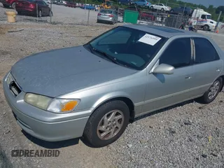 2001 Toyota Camry CE with VIN 4T1BG22K11U805882, listed as a IAAI auction lot 42576999 with 300,777 mi miles and . Bid and sale history available at DreamBid. Image 2.