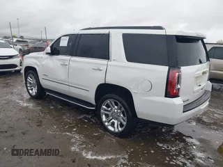 2018 GMC Yukon SLT with VIN 1GKS1BKC8JR392851, listed as a IAAI auction lot 40744741 with 117,028 mi miles. Bid and sale history available at carsss.com. Image 3.