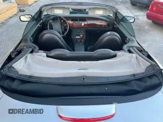 1999 Jaguar XK z VIN SAJGX204XXC041660, wystawiony jako Copart lot #88755785 z przebiegiem 70 091 mil mil oraz Tytuł czysty. Historia ofert i sprzedaży dostępna na DreamBid. Obrazek 9.