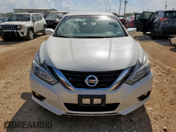 2016 Nissan Altima S with VIN 1N4AL3AP0GC239037, listed as a Copart auction lot 62390695 with 77,005 mi miles and Salvage title. Bid and sale history available at DreamBid. Image 5.