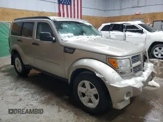 2010 Dodge Nitro SXT z VIN 1D4PU5GK8AW124381, wystawiony jako Copart lot #89302485 z przebiegiem 115 947 mil mil oraz Czysty tytuł • Clean title. Historia ofert i sprzedaży dostępna na DreamBid. Obrazek 4.
