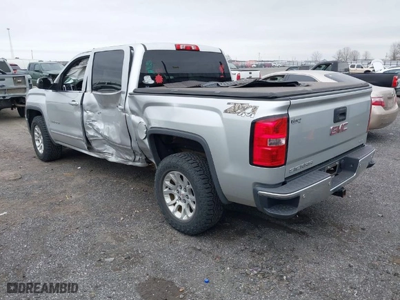 2014 GMC Sierra 1500 SLE with VIN 3GTU2UEC0EG558486, listed as a IAAI auction lot 41750451 with 173,098 mi miles. Bid and sale history available at carsss.com. Image 3.
