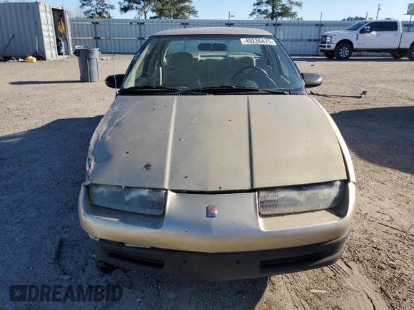 1995 Saturn SL with VIN 1G8ZH5288SZ350078, listed as a Copart auction lot 49236475 with 54,621 mi miles and Salvage title. Bid and sale history available at DreamBid. Image 5.
