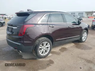 2021 Cadillac XT5 FWD Luxury with VIN 1GYKNAR44MZ184070, listed as a IAAI auction lot 41934265 with 60,596 mi miles and . Bid and sale history available at DreamBid. Image 4.