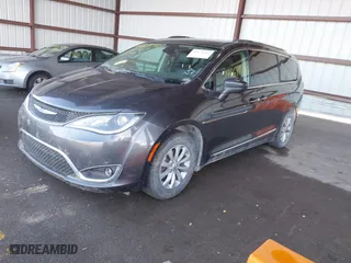 2019 Chrysler Pacifica Touring L with VIN 2C4RC1BG3KR554320, listed as a IAAI auction lot 41671365 with 116,414 mi miles. Bid and sale history available at carsss.com. Image 17.