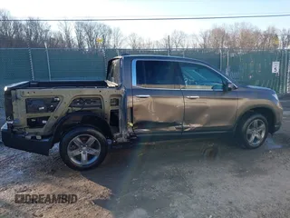 2022 Honda Ridgeline RTL-E with VIN 5FPYK3F79NB005152, listed as a IAAI auction lot 41754891 with 60,191 mi miles and . Bid and sale history available at DreamBid. Image 14.