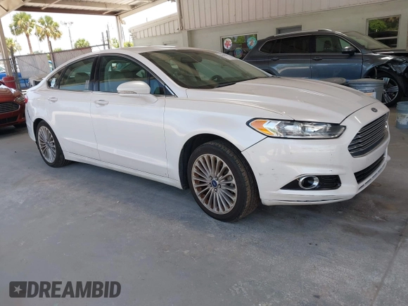 2016 Ford Fusion Titanium with VIN 3FA6P0K96GR390989, listed as a IAAI auction lot 42634275 with 123,559 mi miles and . Bid and sale history available at DreamBid. Image 1.