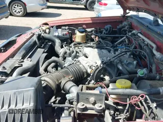 2000 Nissan Frontier XE with VIN 1N6ED27T3YC375054, listed as a IAAI auction lot 41873026 with 287,604 mi miles and . Bid and sale history available at DreamBid. Image 12.