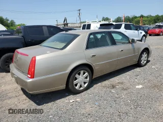 2006 Cadillac DTS 1SC z VIN 1G6KD57Y26U175599, wystawiony jako Copart lot #59149155 z przebiegiem 172 952 mil mil oraz Czysty tytuł • Clean title. Historia ofert i sprzedaży dostępna na DreamBid. Obrazek 3.