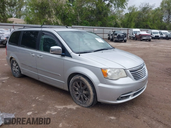 2011 Chrysler Town & Country Touring-L with VIN 2A4RR8DGXBR734005, listed as a IAAI auction lot 41874573 with 170,215 mi miles. Bid and sale history available at carsss.com. Image 1.