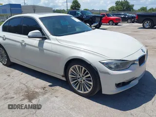 2014 BMW 3 Series 328i with VIN WBA3A5C54EP600398, listed as a IAAI auction lot 42665302 with 117,012 mi miles and . Bid and sale history available at DreamBid. Image 6.