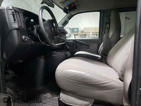 2016 Chevrolet Express Passenger LT with VIN 1GAZGPFF1G1336602, listed as a Copart auction lot 83389654 with 164,012 mi miles and Salvage title. Bid and sale history available at DreamBid. Image 7.
