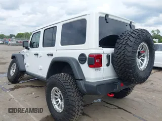2021 Jeep Wrangler Unlimited Rubicon with VIN 1C4HJXFG7MW527498, listed as a IAAI auction lot 42393520 with 18,085 mi miles and . Bid and sale history available at DreamBid. Image 3.