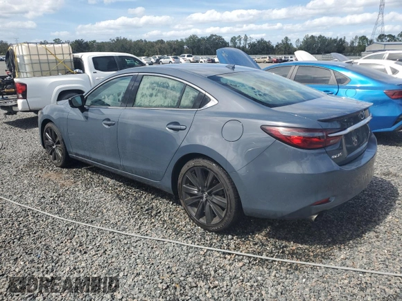 2021 Mazda 6 Grand Touring Reserve with VIN JM1GL1WY6M1617833, listed as a Copart auction lot 76189054 with 131,217 mi miles and Non Repairable. Bid and sale history available at DreamBid. Image 2.