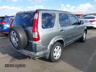 2006 Honda CR-V LX with VIN JHLRD68566C009990, listed as a IAAI auction lot 42024486 with 160,835 mi miles and . Bid and sale history available at DreamBid. Image 4.