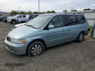 2004 Honda Odyssey EX-L z VIN 5FNRL18064B033388, wystawiony jako Copart lot #52148655 z przebiegiem 187 954 mil mil oraz Szkoda całkowita • Salvage title. Historia ofert i sprzedaży dostępna na DreamBid. Obrazek 1.
