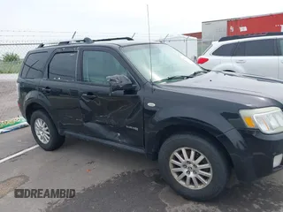 2008 Mercury Mariner Premier z VIN 4M2CU97108KJ32481, wystawiony jako IAAI lot #42365545 z przebiegiem 227 015 mil mil oraz . Historia ofert i sprzedaży dostępna na DreamBid. Obrazek 6.