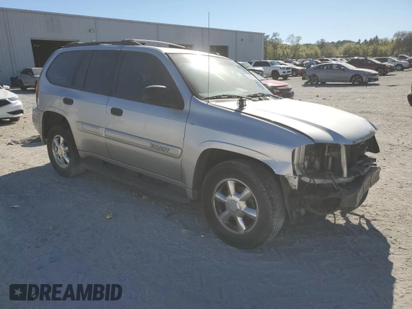 2004 GMC Envoy SLE with VIN 1GKDS13SX42374385, listed as a Copart auction lot 50150065 with 0 mi miles and Salvage Title. Bid and sale history available at carsss.com. Image 4.