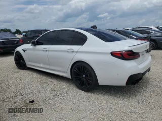 2023 BMW M5 with VIN WBS83CH05PCL80275, listed as a Copart auction lot 67145384 with 39,043 mi miles and Salvage Title. Bid and sale history available at carsss.com. Image 2.