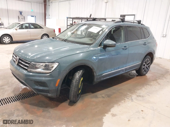 2021 Volkswagen Tiguan SE with VIN 3VV2B7AX6MM077337, listed as a IAAI auction lot 41345637 with 62,989 mi miles. Bid and sale history available at carsss.com. Image 18.