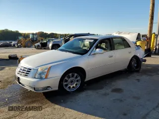 2010 Cadillac DTS 1SC z VIN 1G6KD5EY3AU133406, wystawiony jako Copart lot #73737624 z przebiegiem Nie podano mil oraz Szkody całkowita. Historia ofert i sprzedaży dostępna na DreamBid. Obrazek 1.