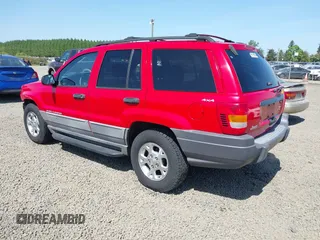 1999 Jeep Grand Cherokee Laredo with VIN 1J4GW58S5XC644757, listed as a IAAI auction lot 42139920 with 192,745 mi miles and . Bid and sale history available at DreamBid. Image 3.