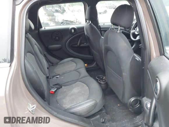 2014 MINI Countryman S with VIN WMWZC5C55EWP41717, listed as a IAAI auction lot 42324347 with Not provided miles and . Bid and sale history available at DreamBid. Image 8.