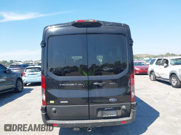 2019 Ford Transit Passenger XL z VIN 1FBAX2CG4KKA76658, wystawiony jako IAAI lot #41859748 z przebiegiem 155 033 mil mil oraz . Historia ofert i sprzedaży dostępna na DreamBid. Obrazek 16.