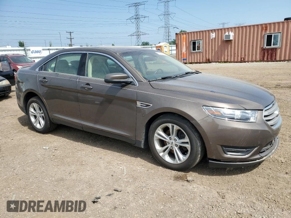 2015 Ford Taurus SEL with VIN 1FAHP2E82FG158662, listed as a Copart auction lot 58233875 with 159,174 mi miles and Salvage title. Bid and sale history available at DreamBid. Image 4.