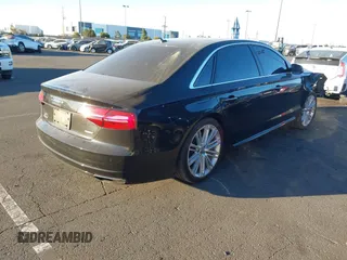 2017 Audi A8 L with VIN WAU44AFD5HN009133, listed as a IAAI auction lot 41352816 with 121,413 mi miles. Bid and sale history available at carsss.com. Image 13.