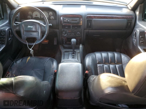2001 Jeep Grand Cherokee Limited with VIN 1J4GX58S01C652737, listed as a Copart auction lot 81635494 with 175,498 mi miles and Salvage Title. Bid and sale history available at DreamBid. Image 8.